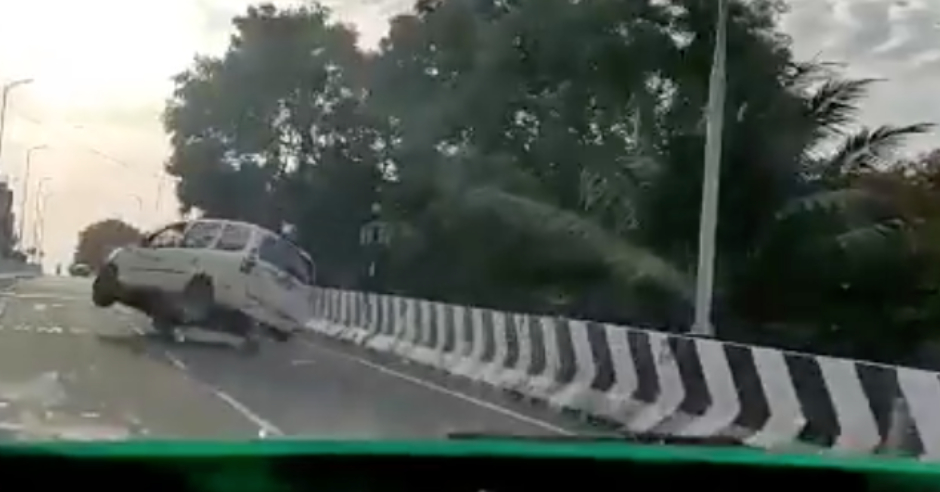 Rash driving leads to accident as Mahindra Xylo flips atop bridge