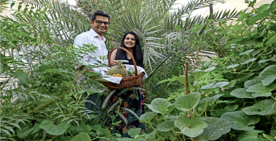 Indian couple in the Abu Dhabi desert Vegetable garden