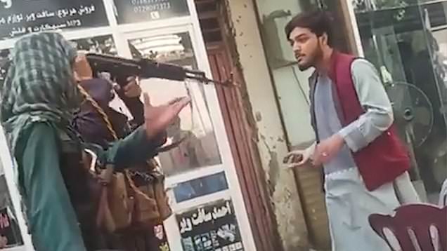 taliban beat kabul man with rifle for playing music
