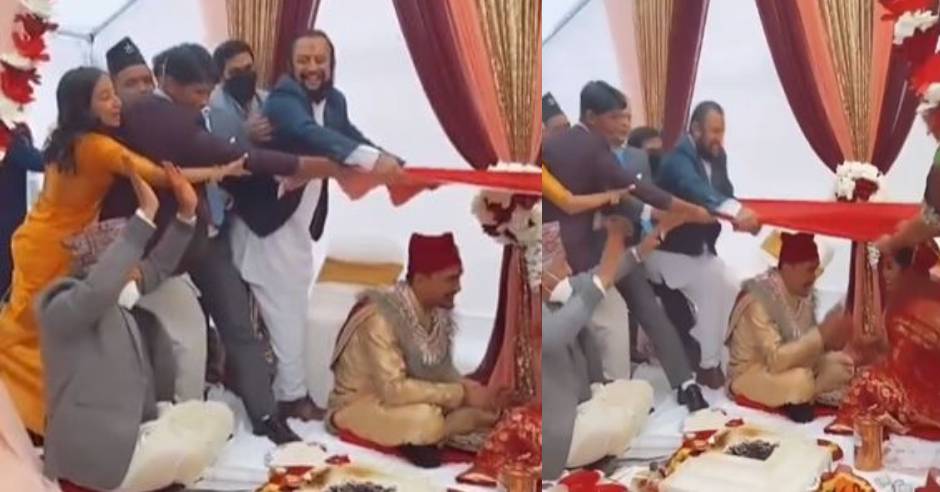 VIDEO: Wedding guests play tug of war goes viral