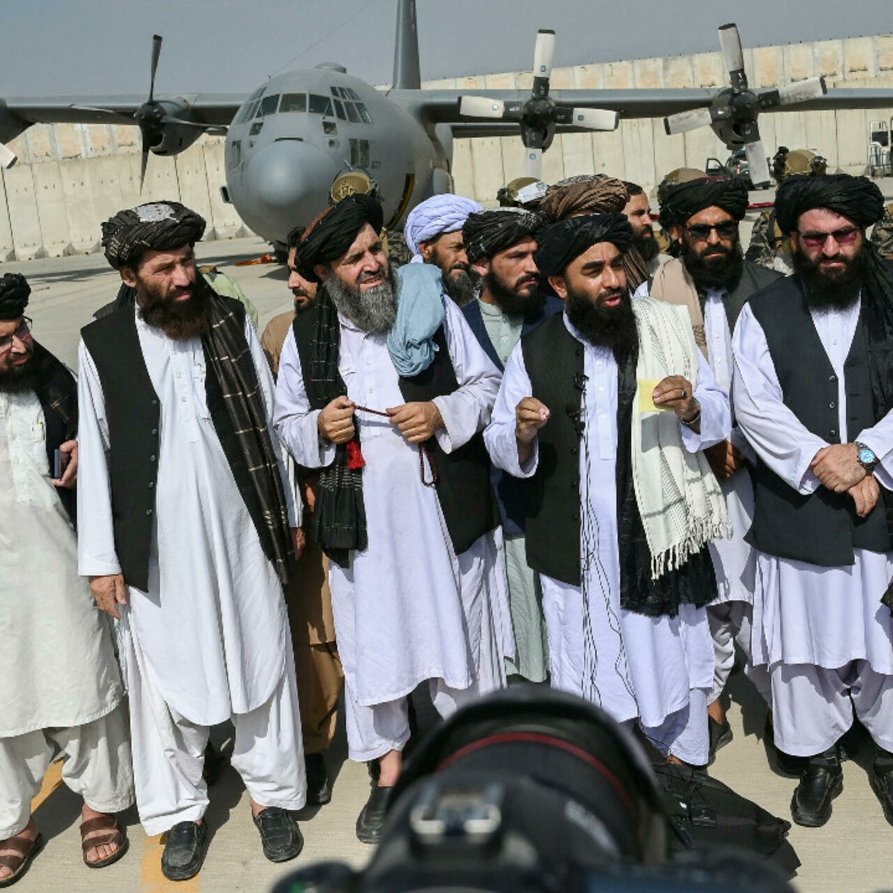 Taliban celebrate with gunfire after US troops flew out of Afghan