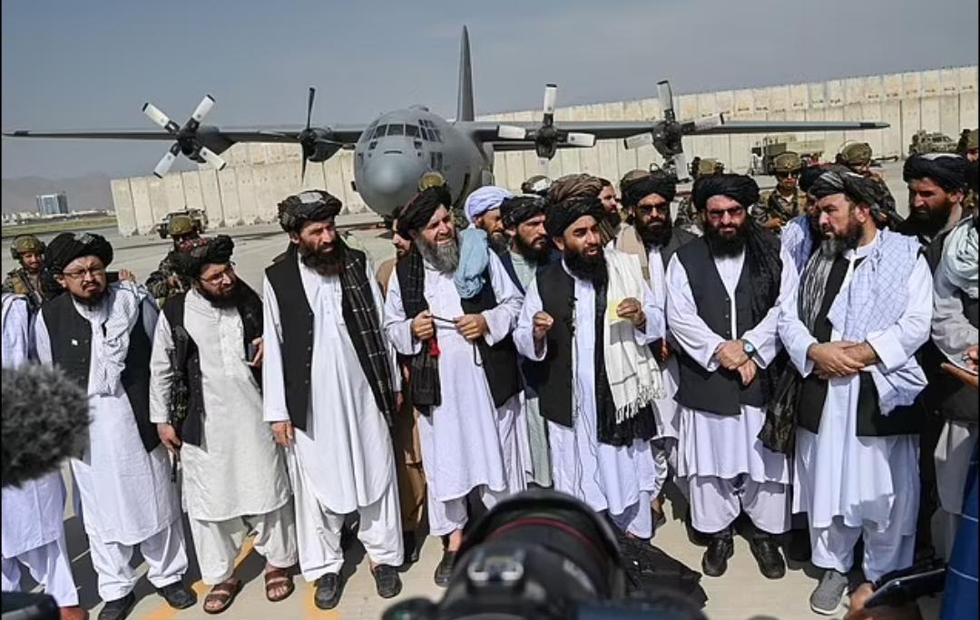 Taliban elite forces slip off vehicle