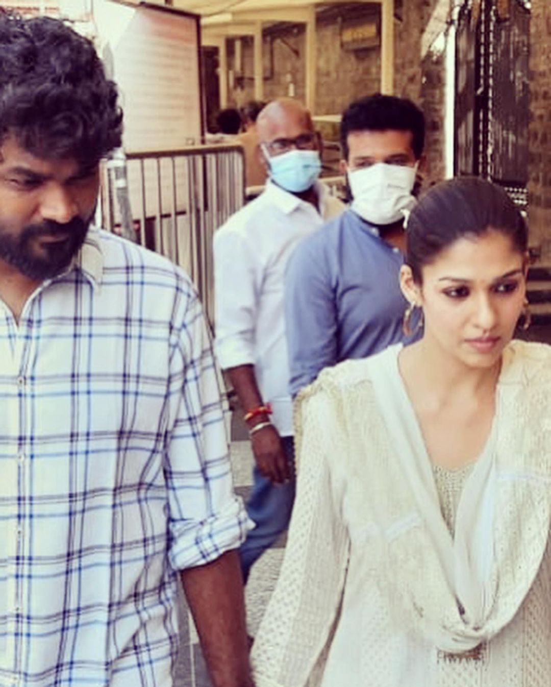 Nayanthara and Vignesh Shivan holding hands and twinning in WHITE is a sight to behold; viral pics