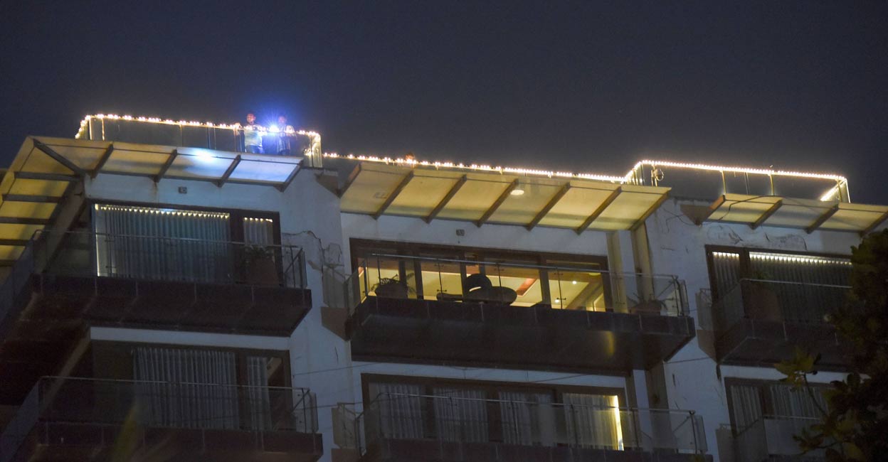 Shah Rukh Khan's house is decorated with colored lights.