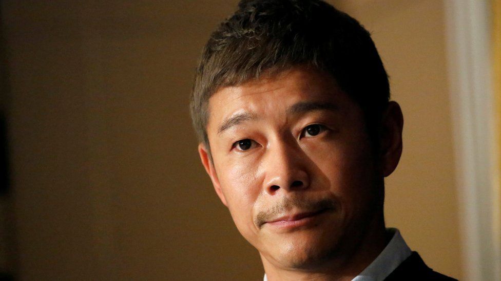 Japanese billionaire returns earth after 12 days space trip