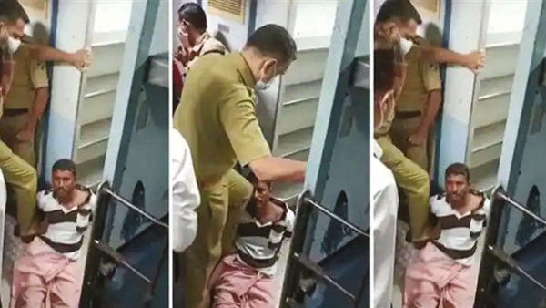 Kerala police officer kicks a ticketless passenger - viral video