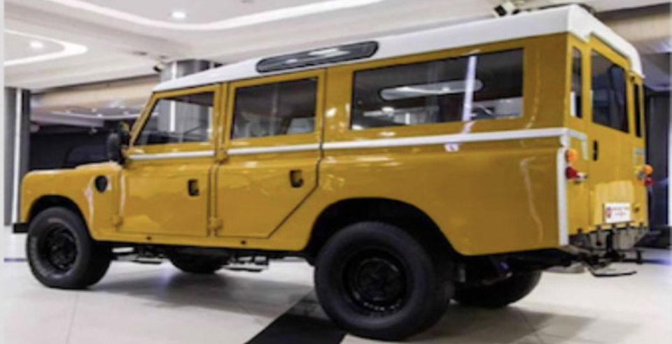 ms dhoni buy yellow vintage Land Rover 3 station wagon car