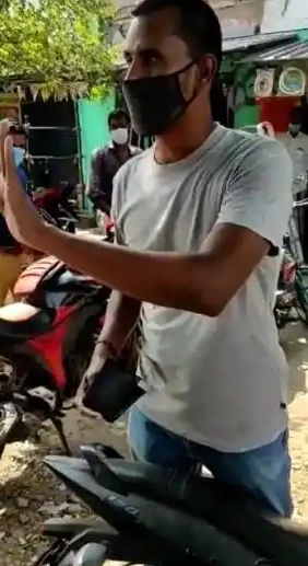 police condemning a teenager for not wearing a helmet