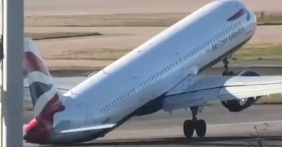 Plane forced to abort landing at windy Heathrow airport
