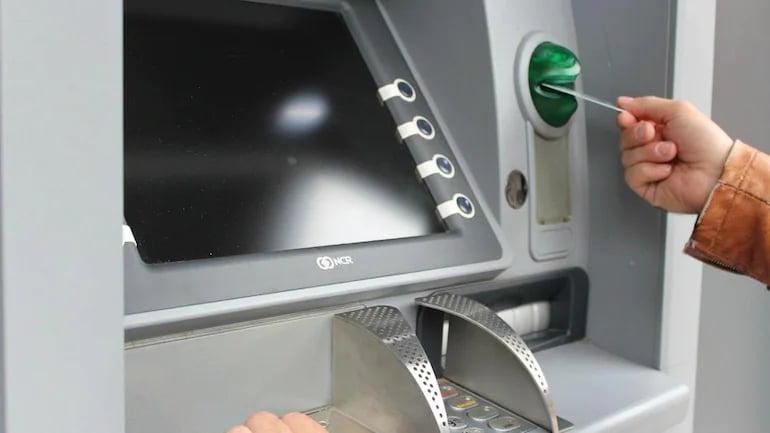 Man Arrested by police after he trying to break ATM Machine