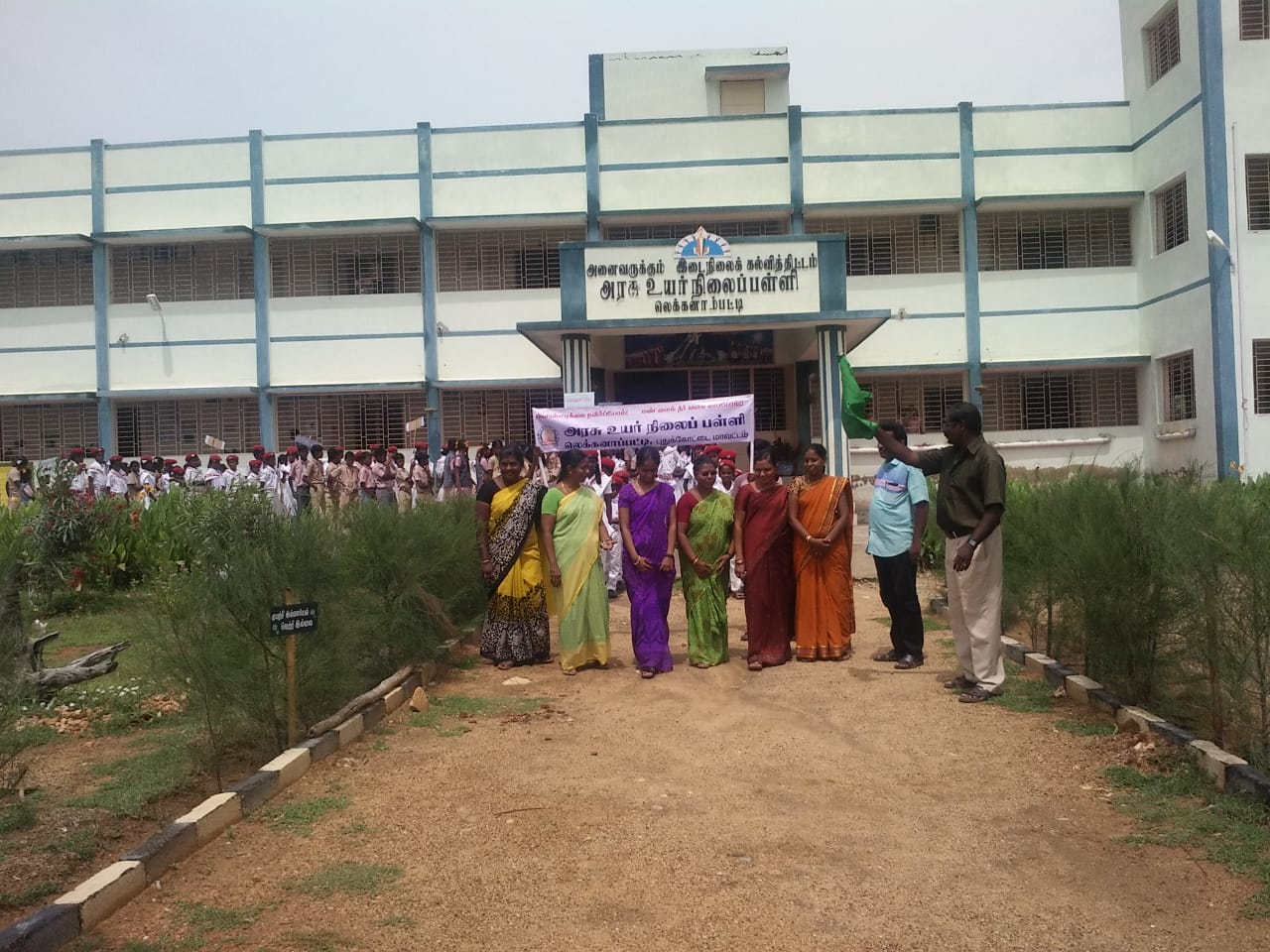  Teachers helping a schoolgirl who has grown up in poverty 