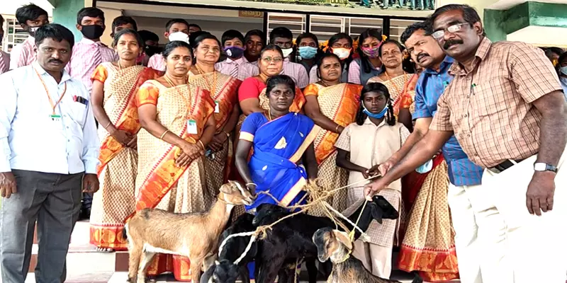  Teachers helping a schoolgirl who has grown up in poverty 
