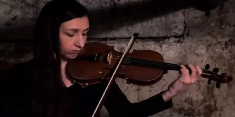 Young violinist from Ukraine plays music amid bombings