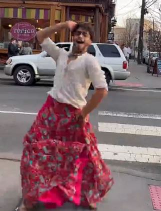 Indian Man in skirt dances on New York streets