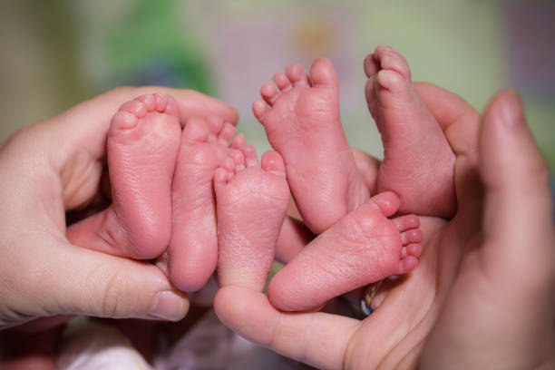 Woman gives birth to one in 200 million identical triplets