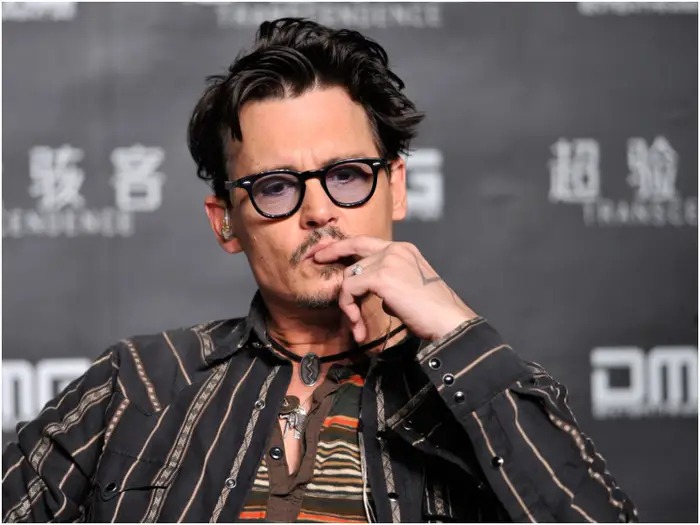 Johnny Depp Posts Message About Moving Forward Amber Heard Reacts