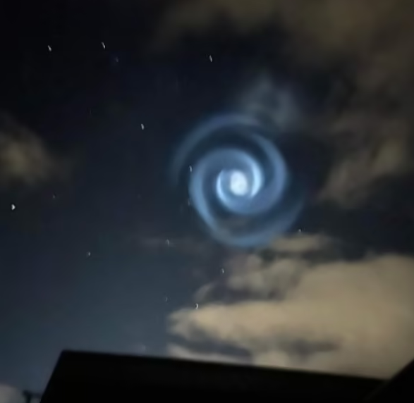Mysterious glowing swirl lights up the night sky