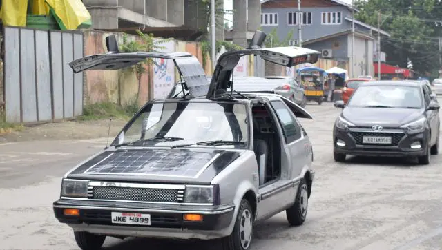 Kashmir teacher invents solar electric car after 11 years of research