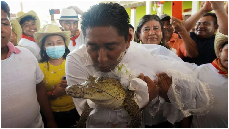 Mexico mayor marries alligator dressed as a bride in age old ritual