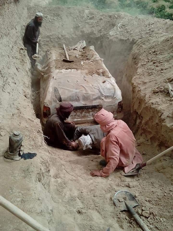 taliban excavate founder mullah omar car photo surfaces