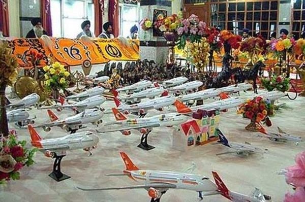 Devotees offer toy planes at gurudwara in hopes of a trip abroad