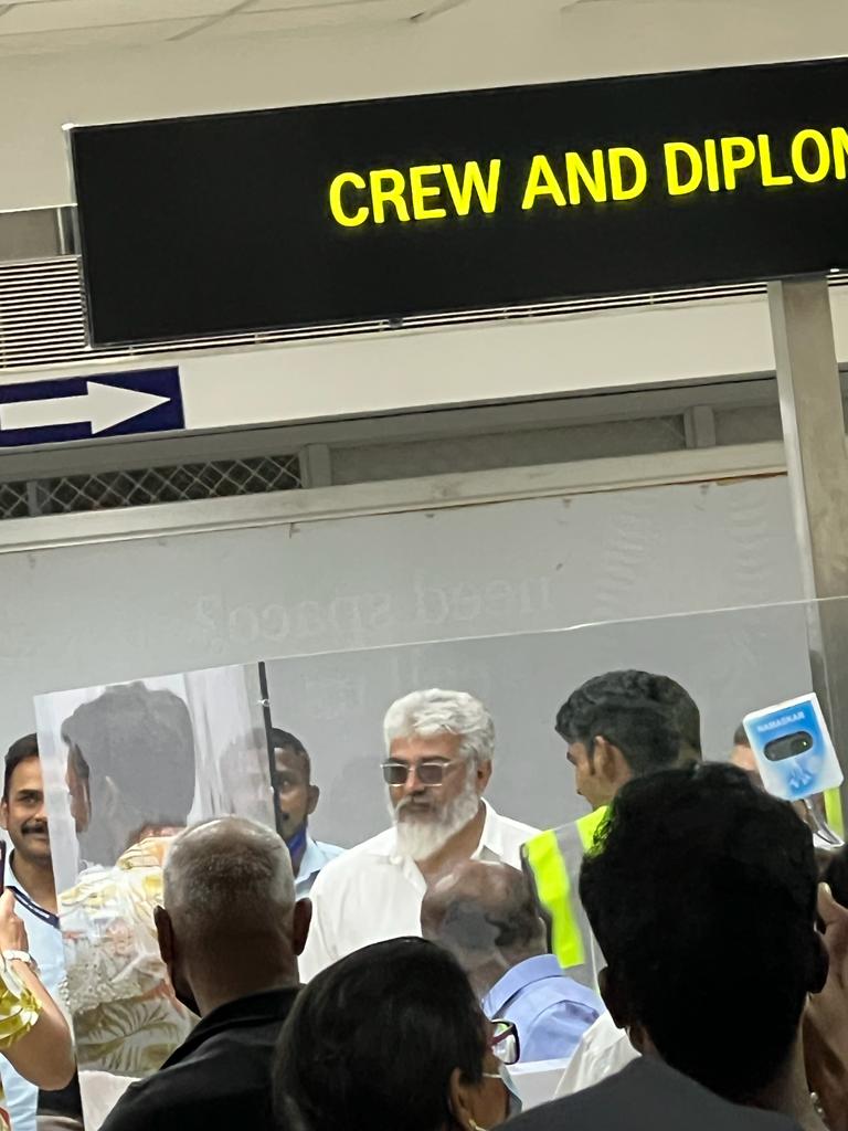 AK Ajith Kumar Returns to Chennai Viral Photos with Fans at Airport
