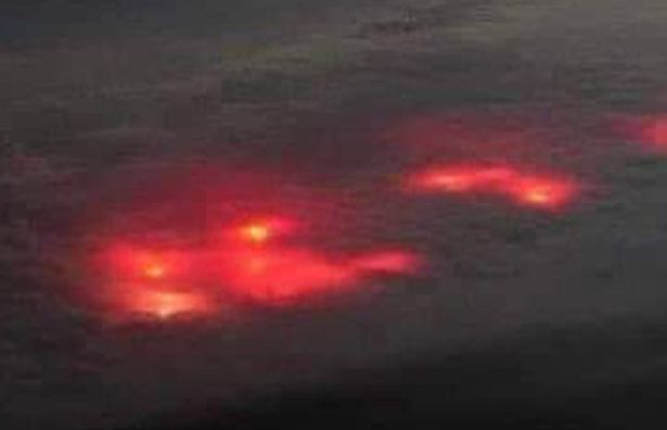 Pilot Spots Mysterious Red Glow In Clouds Over Atlantic Ocean