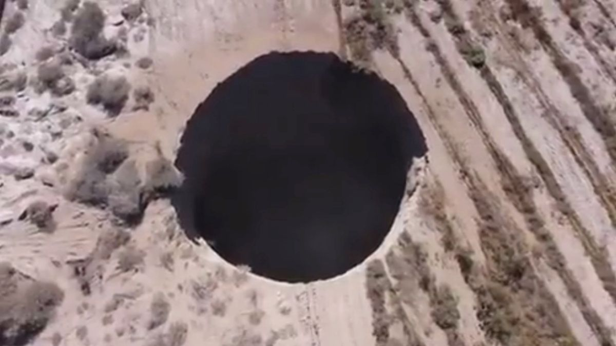 sinkhole tears open the ground in the chile copper mine