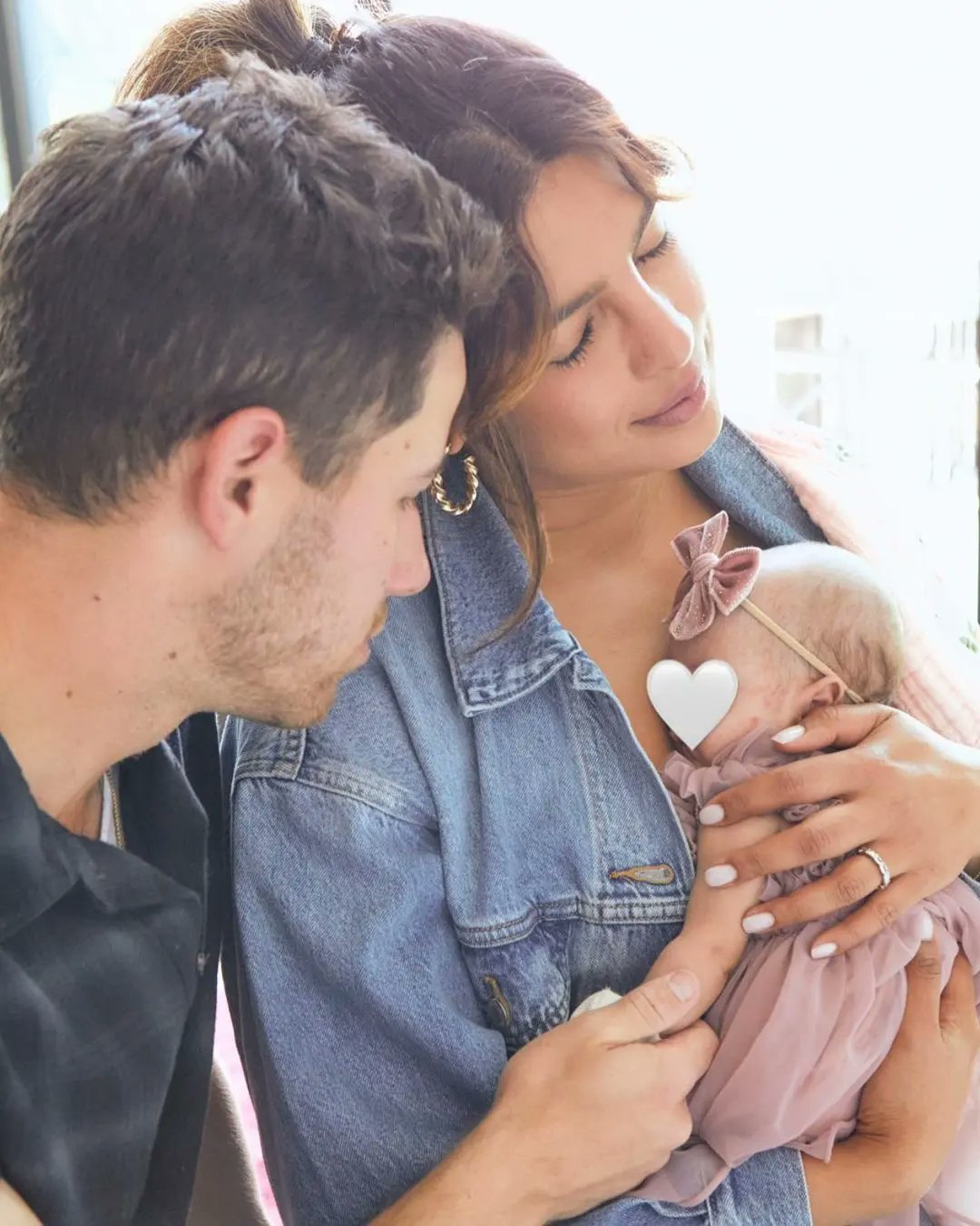 Priyanka Chopra with Her Daughter and Husband Nick Jonas