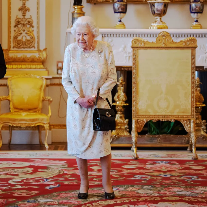 The Queen always carried a handbag to give secret signals