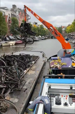 Dozens Of Bikes Pulled Out Of Canal In Amsterdam