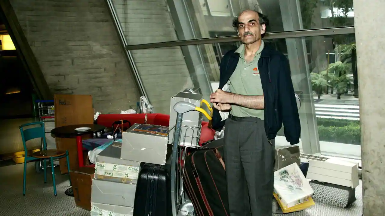 An Iranian man who lived in Paris airport for 18 years dies