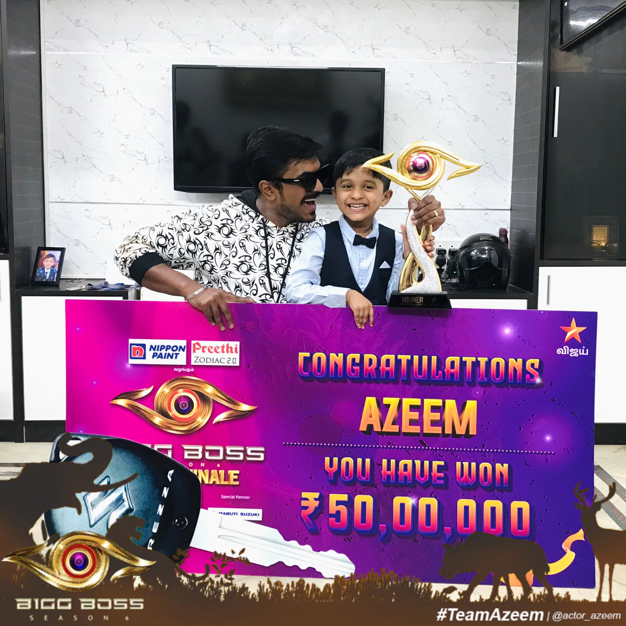 Azeem pic with his son after bigg boss title winner
