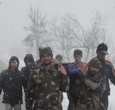 Army men carry pregnant woman on shoulders in snowfall for 5 km 