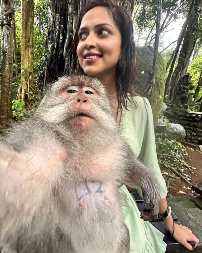 Amala Paul Poses with a monkey Indonesia Tour photos 