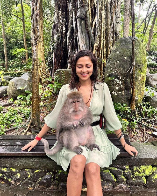 Amala Paul Poses with a monkey Indonesia Tour photos 