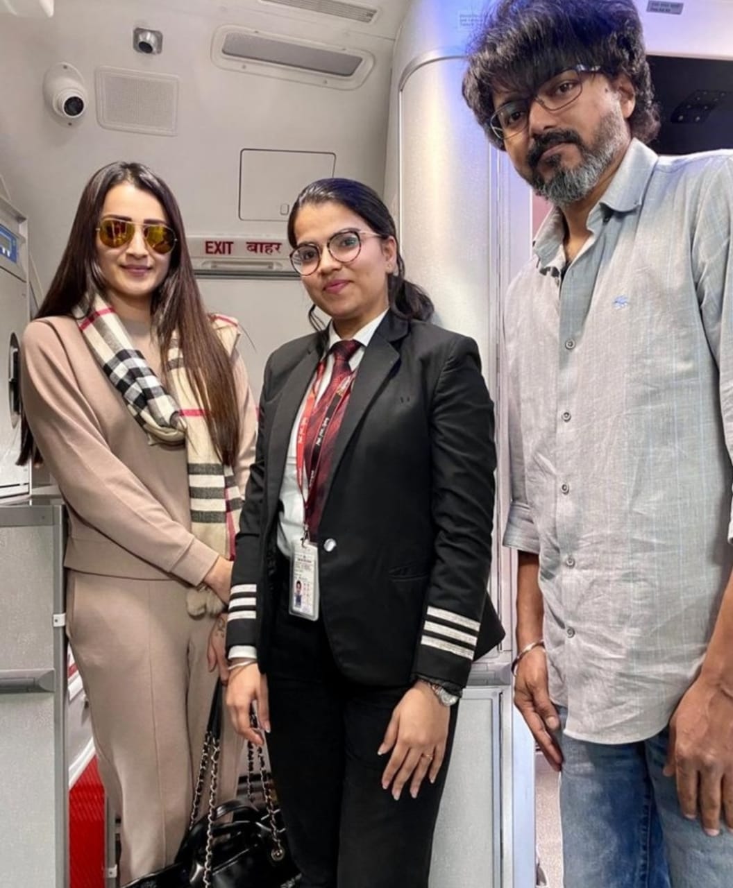 Actor Vijay and actress Trisha in Flight pic Goes Viral