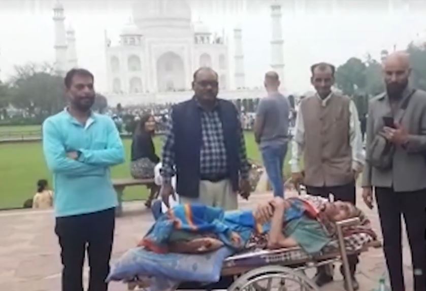 Man took 85 yr old mother to taj mahal on stretcher photo viral